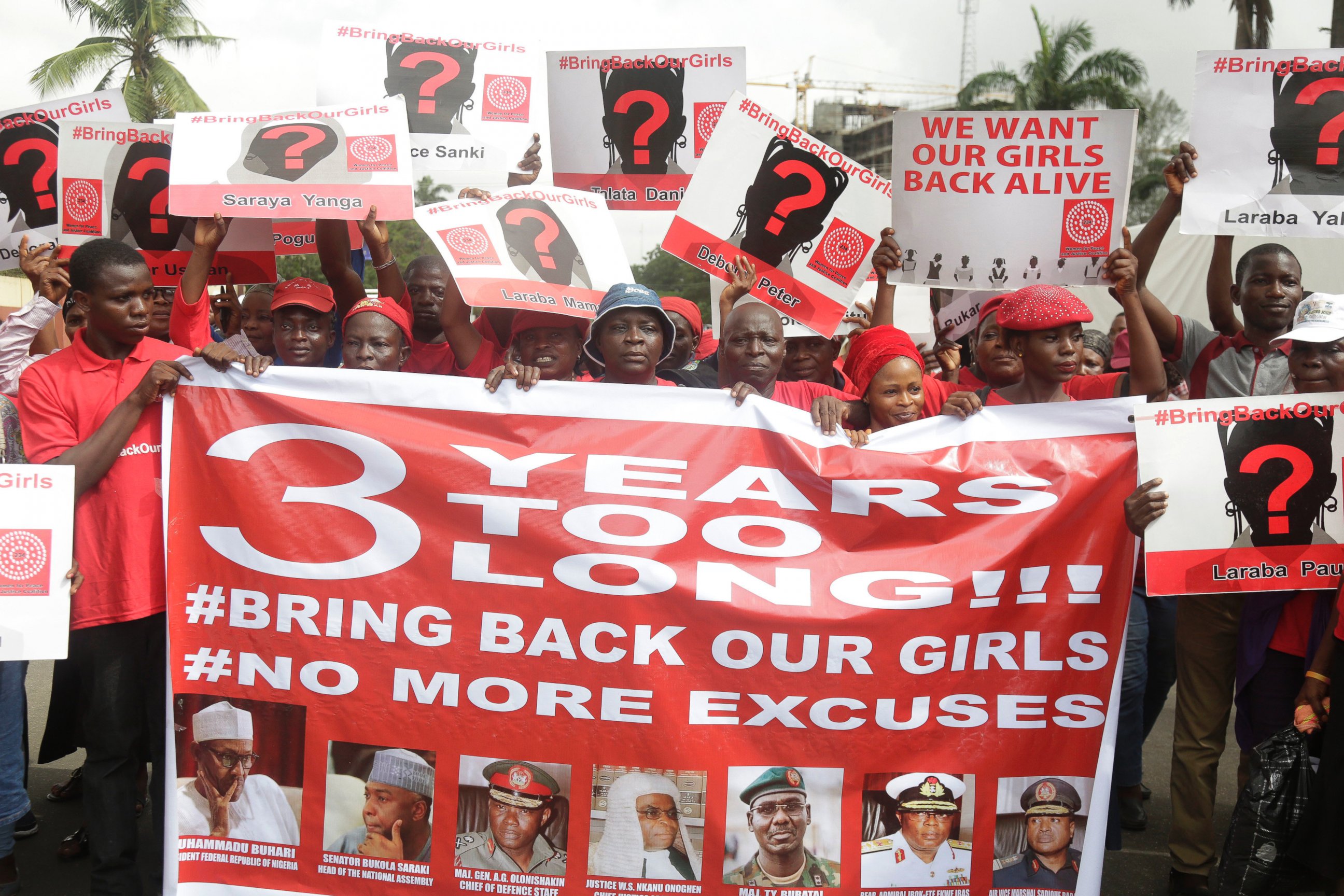 PHOTO: Bring back our girls campaigners hold up banners during a protest calling on the government to rescue the remaining kidnapped girls of the government secondary school who were abducted almost three years ago, in Lagos, Nigeria, April. 13, 2017.