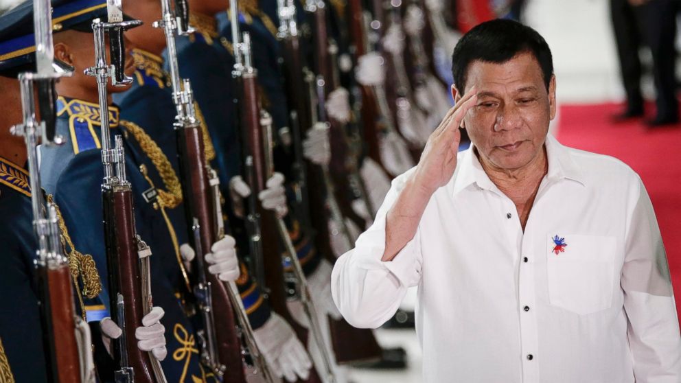 PHOTO: Philippine President Rodrigo Duterte reviews honor guards during a departure ceremony at the Manila International Airport in Pasay City, south of Manila, Philippines, Dec. 13, 2016.