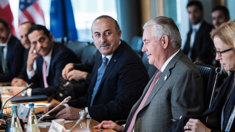 PHOTO: U.S. Secretary of State Rex Tillerson, second from right, and Turkish Foreign Minister Mevlut Cavusoglu, third from right, sit with other diplomats before a meeting on Syria at the World Conference Center in Bonn, Germany, Feb.17, 2017.