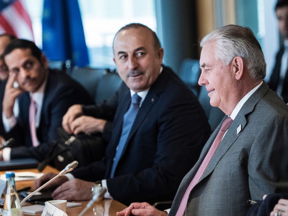 PHOTO: U.S. Secretary of State Rex Tillerson, second from right, and Turkish Foreign Minister Mevlut Cavusoglu, third from right, sit with other diplomats before a meeting on Syria at the World Conference Center in Bonn, Germany, Feb.17, 2017.