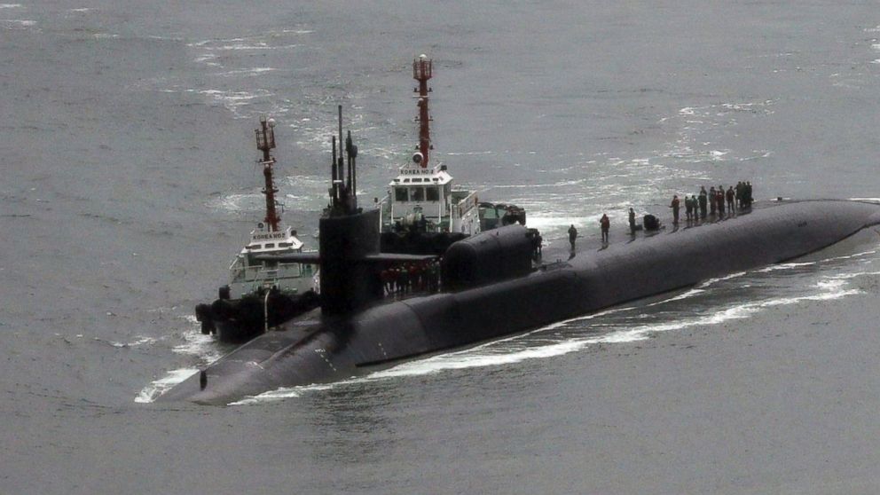 PHOTO: The nuclear-powered submarine USS Michigan approaches to join the U.S. aircraft carrier USS Carl Vinson in drills near the Korean Peninsula, at Busan port in Busan, South Korea, on April 25, 2017. 