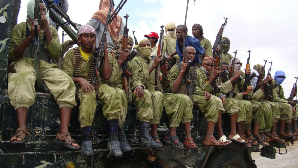 Al-Shabab fighters sit on a truck as they patrol in Mogadishu, Somalia, Oct. 30, 2009.