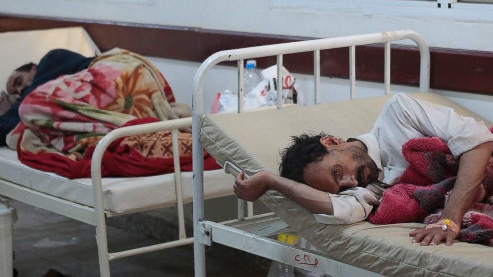 Patients being treated for suspected cholera infections lie on beds at a hospital in Sanaa, Yemen, May 15, 2017. The U.N. humanitarian coordinator in Yemen says a cholera outbreak has killed 115 people over the past two weeks. 