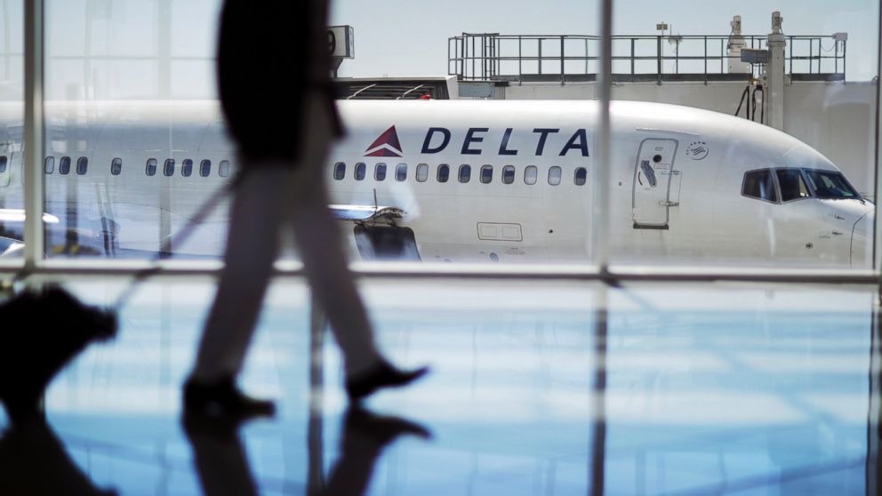 A Delta Air Lines jet sits at a gate at Hartsfield-Jackson Atlanta International Airport in Atlanta, Oct. 13, 2016.