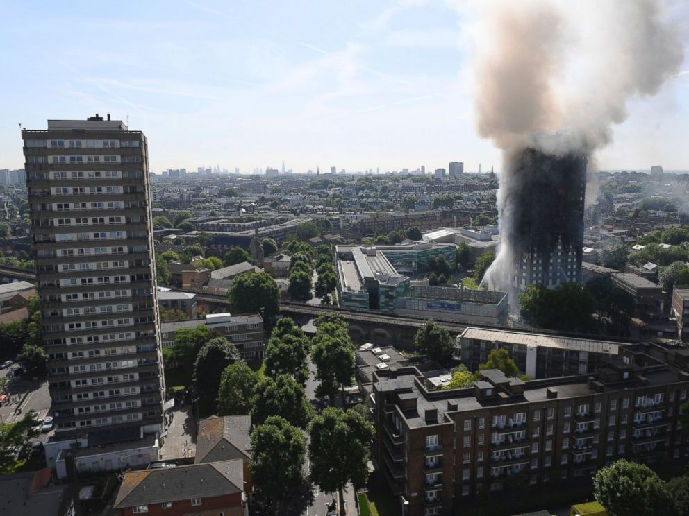 PHOTO: Smoke billows from a fire that has engulfed the 24-story Grenfell Tower in west London, June 14, 2017.