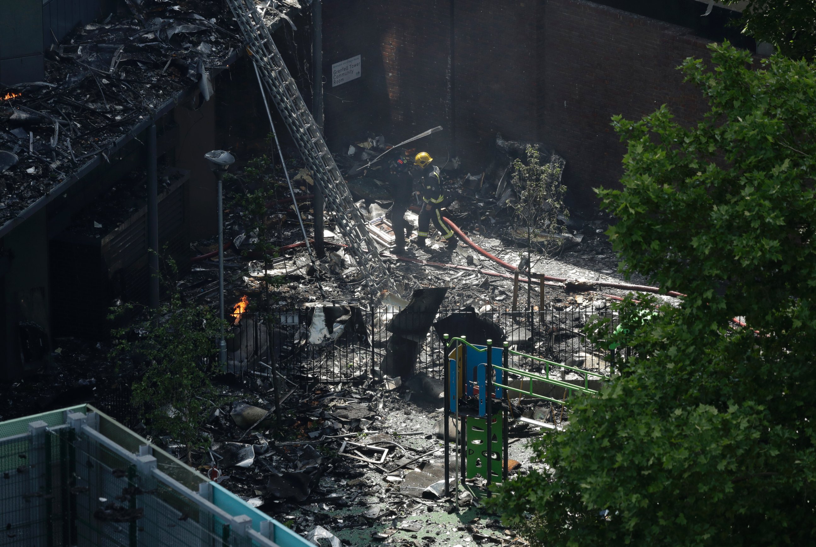 PHOTO: Firefighters battle a massive fire that raged in a high-rise apartment building in London, June 14, 2017.