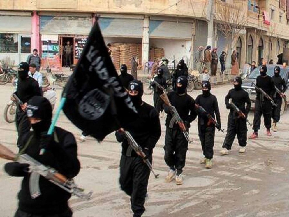 PHOTO: This undated file image posted on a militant website on Jan. 14, 2014, which has been verified and is consistent with other AP reporting, shows fighters from the al-Qaida linked Islamic State of Iraq and the Levant (ISIL) in Raqqa, Syria.