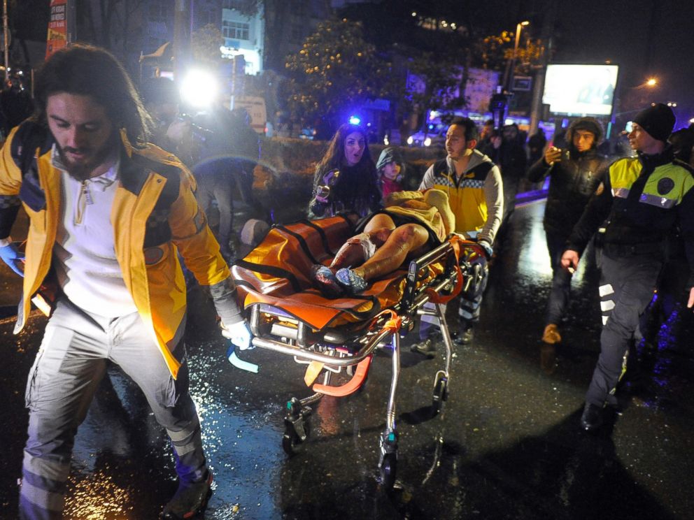 PHOTO: Medics carry a wounded person at the scene after an attack at a popular nightclub in Istanbul, early on Jan. 1, 2017.