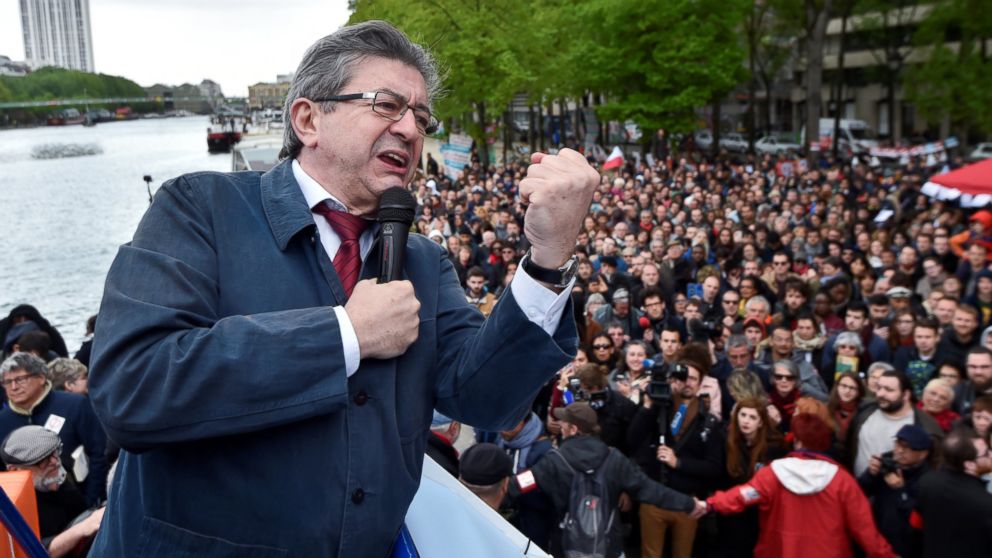 PHOTO: Jean-Luc Melenchon, candidate of the French far-left Parti de Gauche and candidate for the French 2017 presidential election, delivers a speech to supporters from a barge during a cruise on the canal de l'Ourcq in Paris, April 17, 2017.