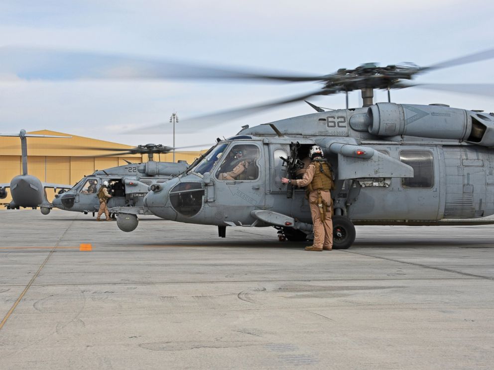 PHOTO: Two U.S. Navy MH-60 Seahawks prepare to takeoff from Al Udeid Air Base, Qatar, Jan. 23, 2017