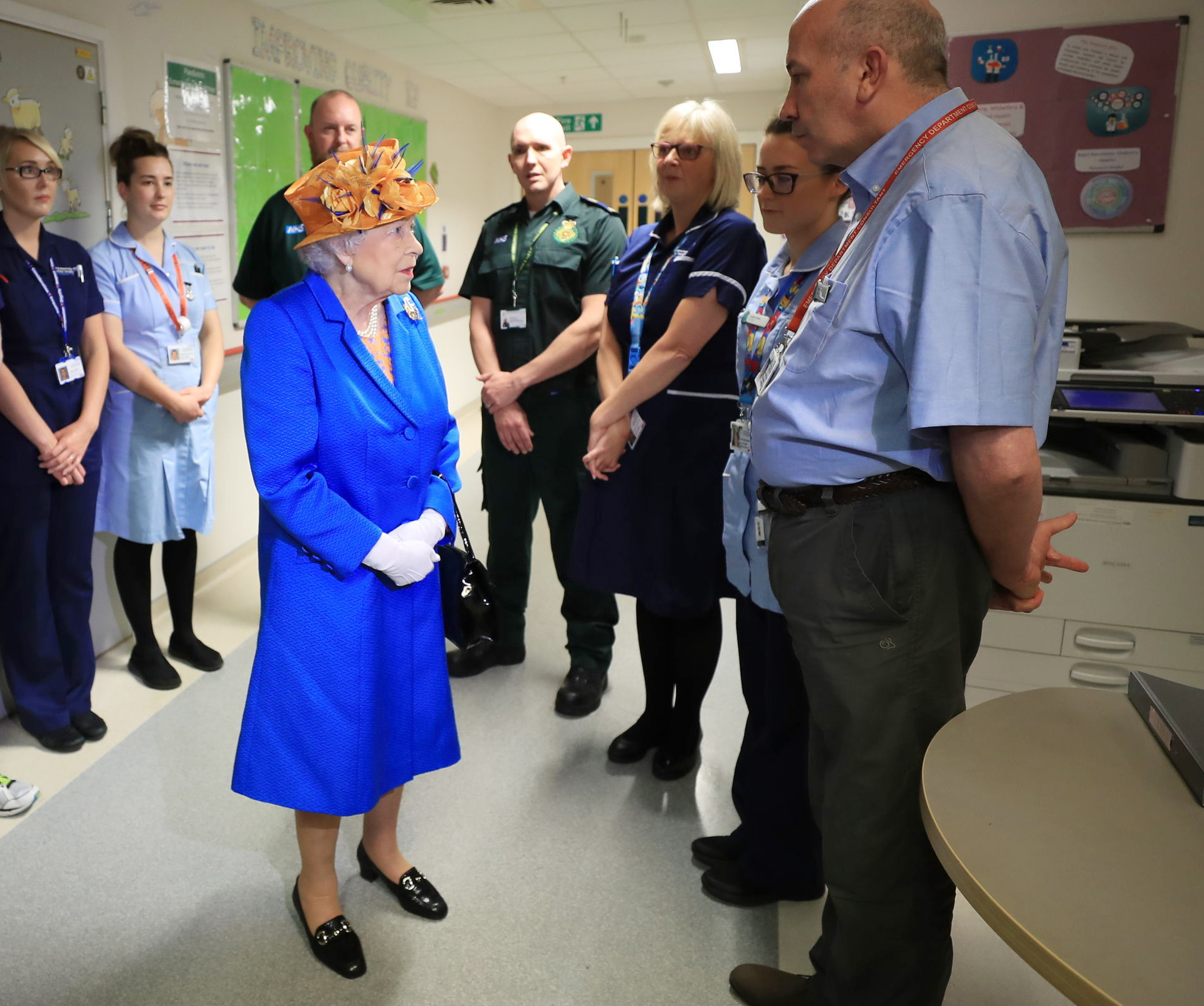 PHOTO:Britain's Queen Elizabeth II speaks with hospital personnel as she visits the Royal Manchester Children's Hospital to meet victims and to thank members of staff who treated them, May 25, 2017.