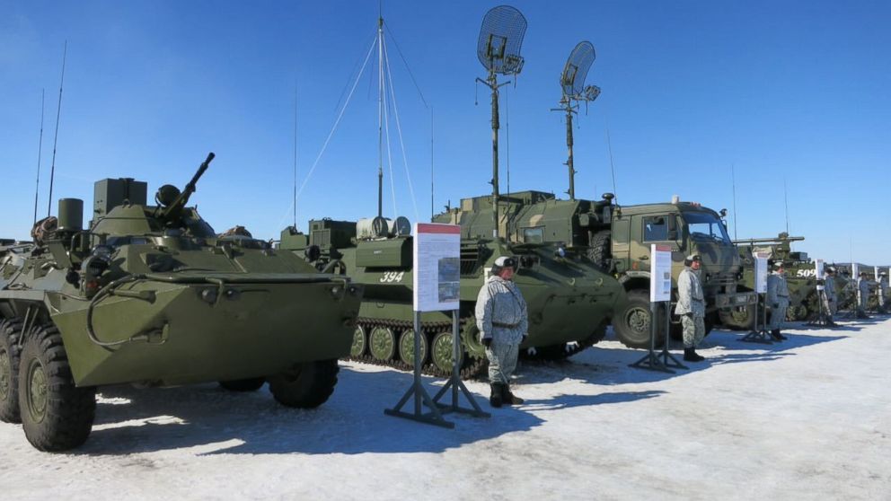 Soldiers of the Arctic motorized rifle brigade of Russia's Northern Fleet stand near military vehicles during an exercise in Alakurtti, Russia.