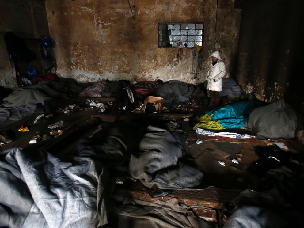 PHOTO: Migrants in sleeping bags rest in an abandoned warehouse in Belgrade, Serbia, Jan. 10, 2017.