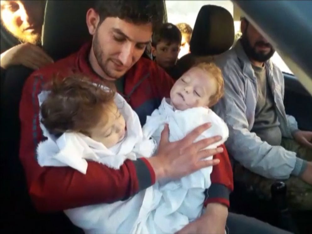 PHOTO: Abdel Hameed al-Youssef cradles the bodies of his nine month old twins after they were killed in a suspected chemical attack on Idlib in Syria on April 4, 2017.