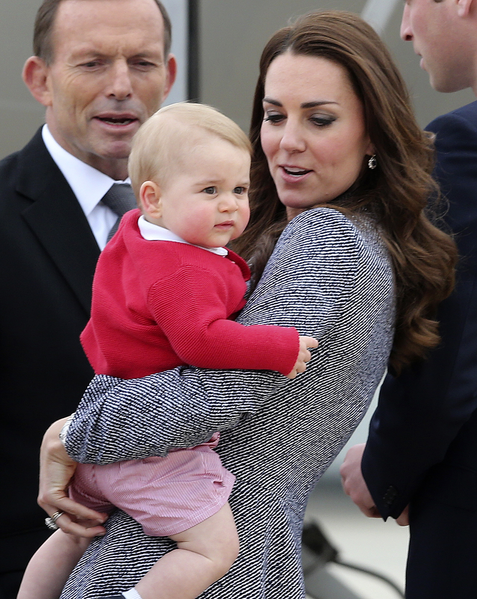 PHOTO: Kate, the Duchess of Cambridge, holds Prince George as they say goodbye before they board their flight in Canberra,  Australia, April 25, 2014.