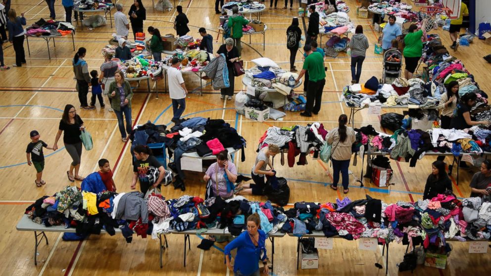 PHOTO: Evacuees from the wildfire in Fort McMurray collect donated necessities at an evacuation center in Lac la Biche, Canada, May 5, 2016. 