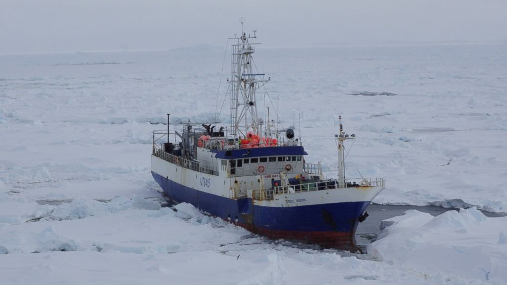 The Austrailian fishing vessel the Antarctic Chieftain is seen from the the Coast Guard Cutter Polar Star as the cutter begins breaking up the ice around the vessel Feb. 13, 2015. 