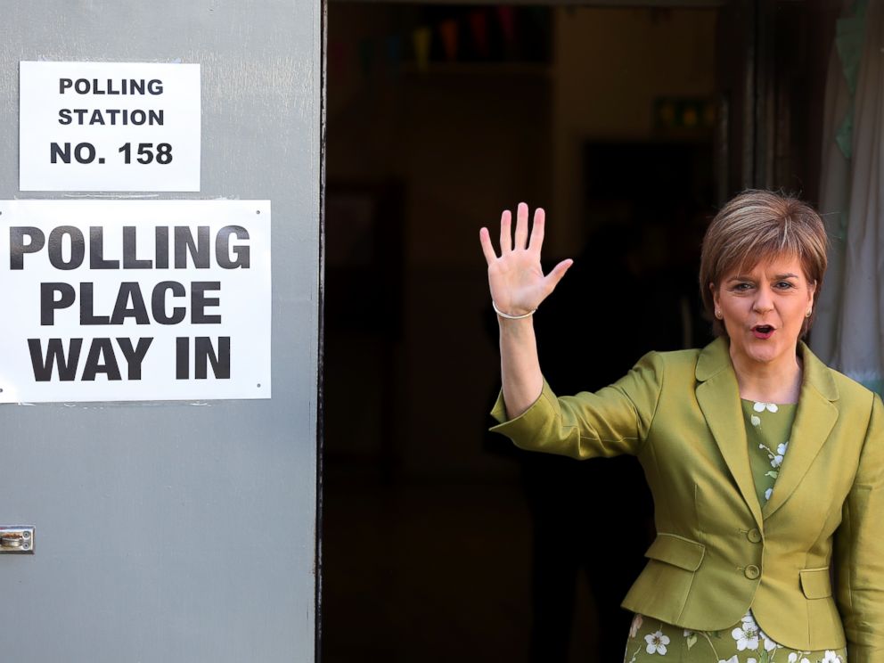 PHOTO: First Minister of Scotland and Scottish National Party leader Nicola Sturgeon poses for photographs after casting her ballot at Broomhouse Community Hall in Broomhouse, Scotland, May 7, 2015.