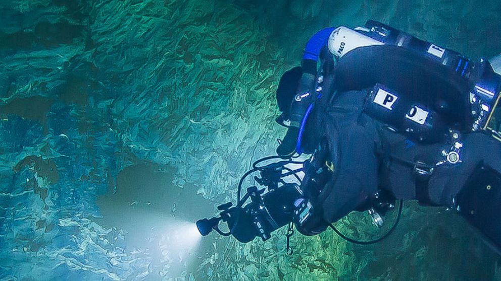 PHOTO: In this underwater photo taken Aug. 15, 2015 in the flooded Hranicka Propast, or Hranice Abyss, in the Czech Republic, Polish explorer Slawomir Packo is exploring the limestone abyss and preparing for deeper exploration.