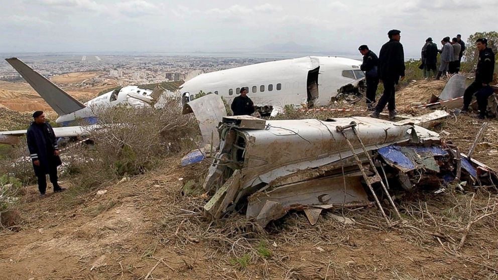 Police guard the debris of an EgyptAir Boeing 737, May 8, 2002, that crashed while trying to land at the Tunis-Carthage airport. 
