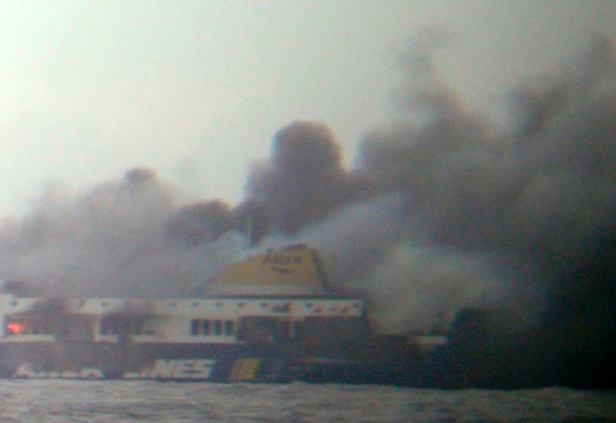 PHOTO: In this photo taken from a nearby ship, smoke rises from the Italian-flagged Norman Atlantic ferry after it caught fire in the Adriatic Sea, Dec. 28, 2014.
