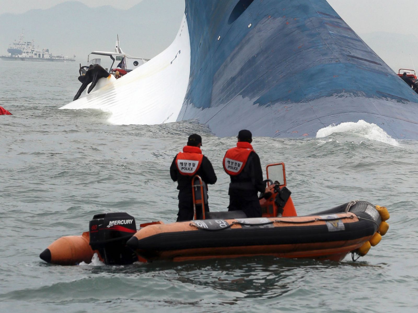 Photo Boat Crews Try To Rescue Passengers From A Ferry Sinking Off