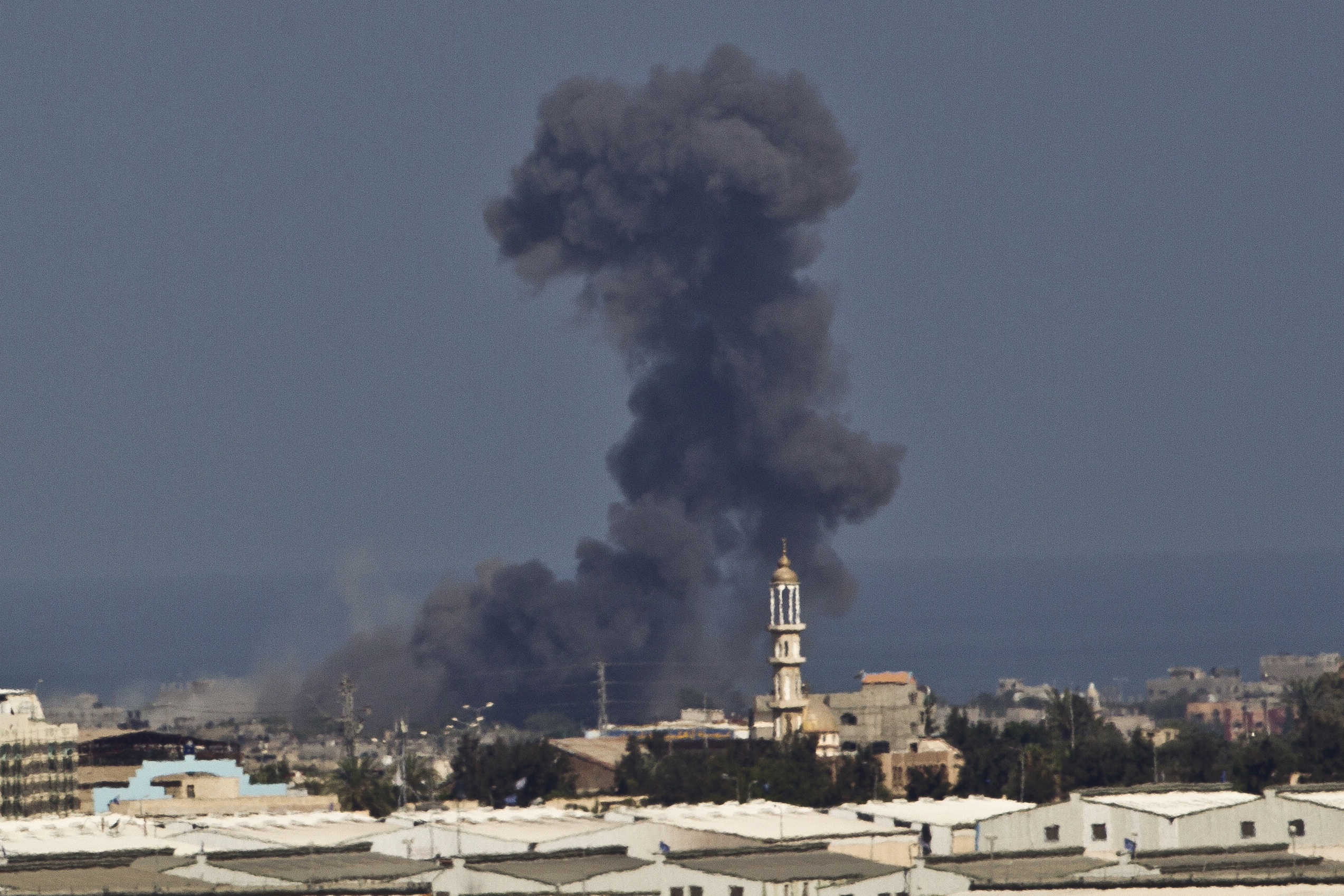 PHOTO: Smoke rises after an Israeli missile strike in Gaza, seen from the Israel Gaza Border, Wednesday, July 16, 2014.