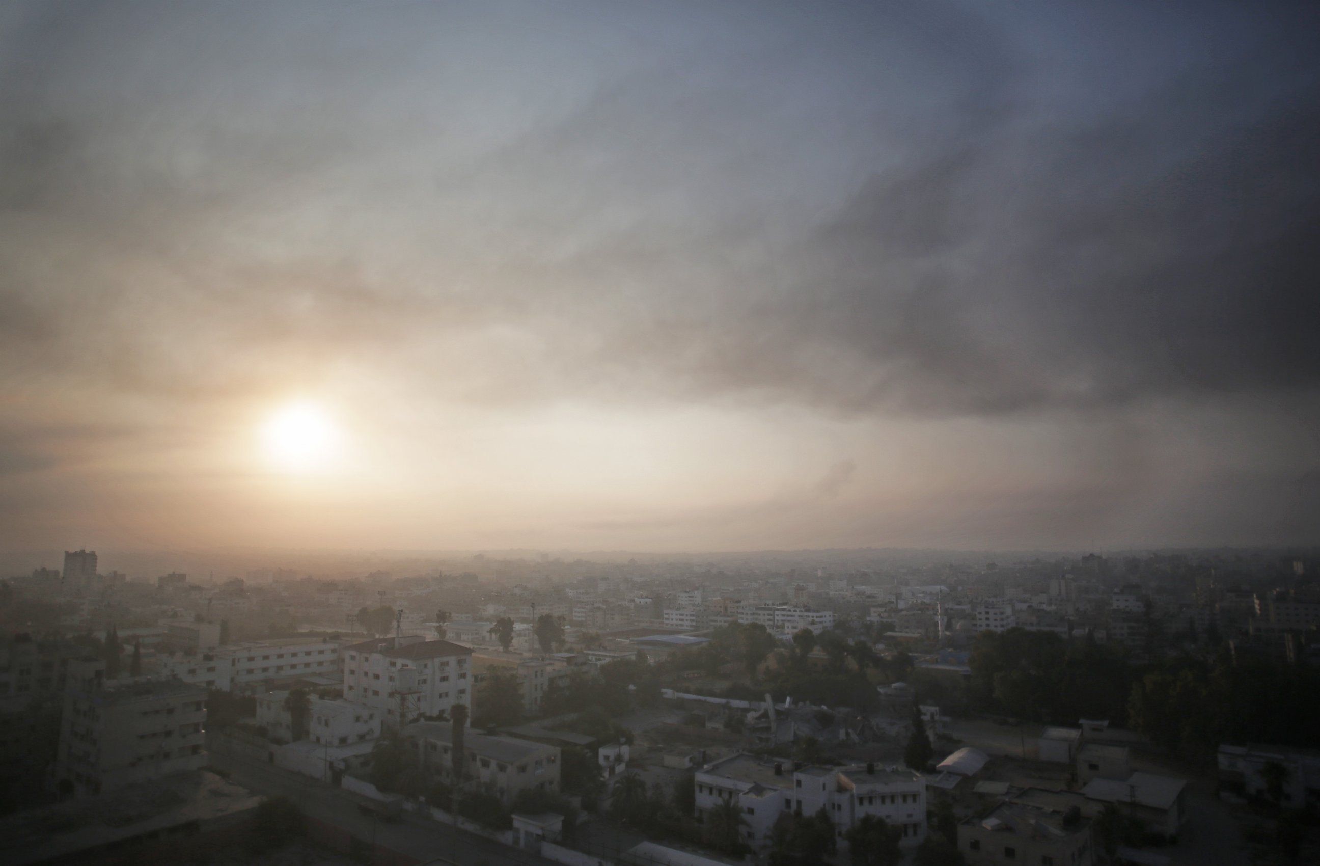 PHOTO: Smoke from Israeli strikes rises over Gaza City, July 29, 2014.