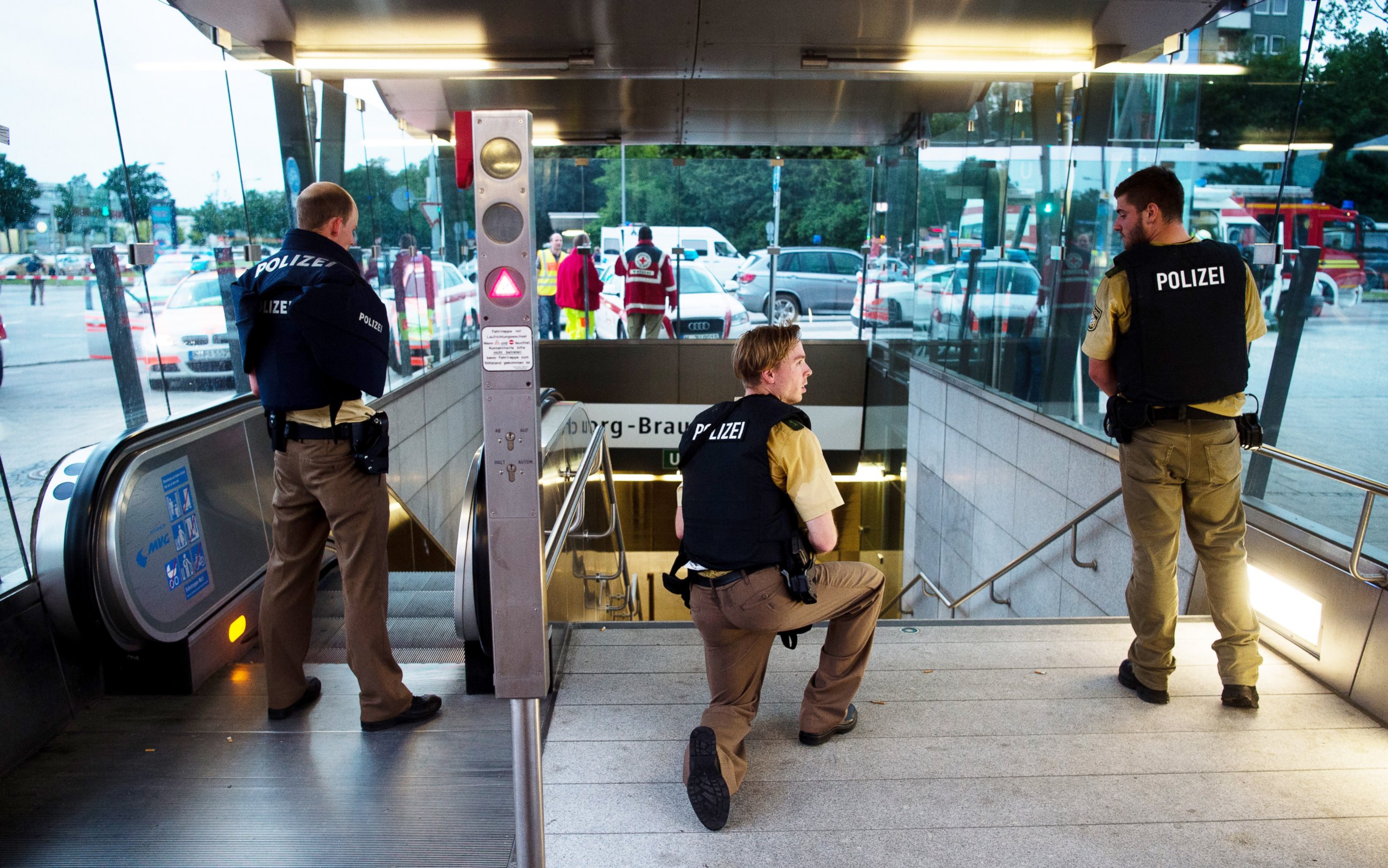 PHOTO: Policemen stand at the underground station Georg-Brauchle-Ring close to the Olympia shopping centre in which a shooting was reported in Munich, on Friday, July 22, 2016. According to media reports police expect several people being killed. 