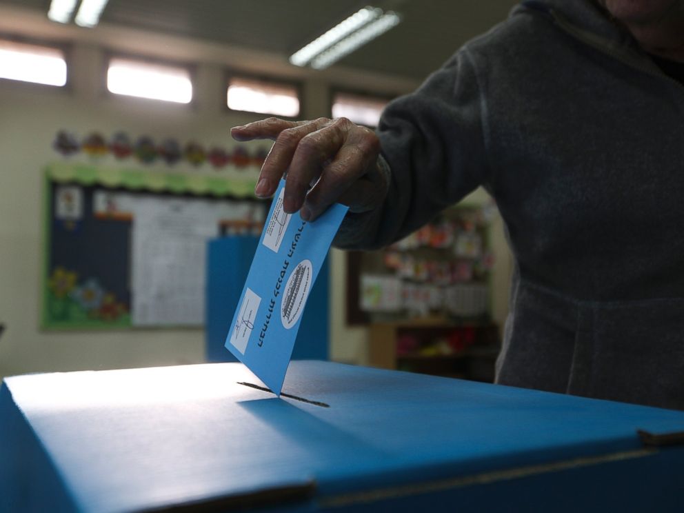 A man cast his vote during legislative elections in Tel Aviv, Israel, Tuesday, March 17, 2015. Israelis are voting in early parliament elections following a campaign focused on economic issues.