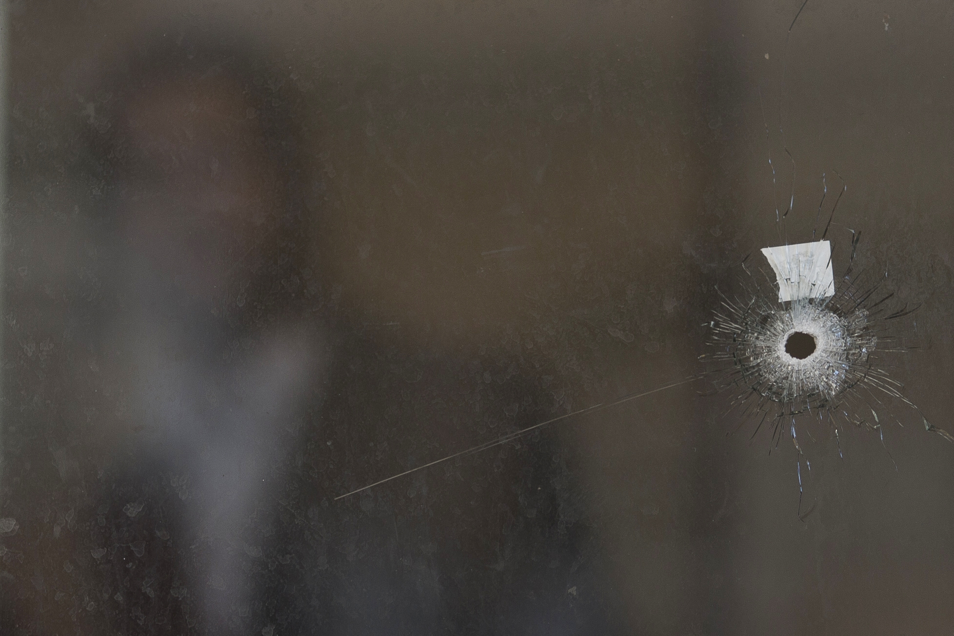 PHOTO: A bullet hole and forensic evidence are seen in side the Synagogue at the site of an attack in Jerusalem, Nov. 18, 2014.