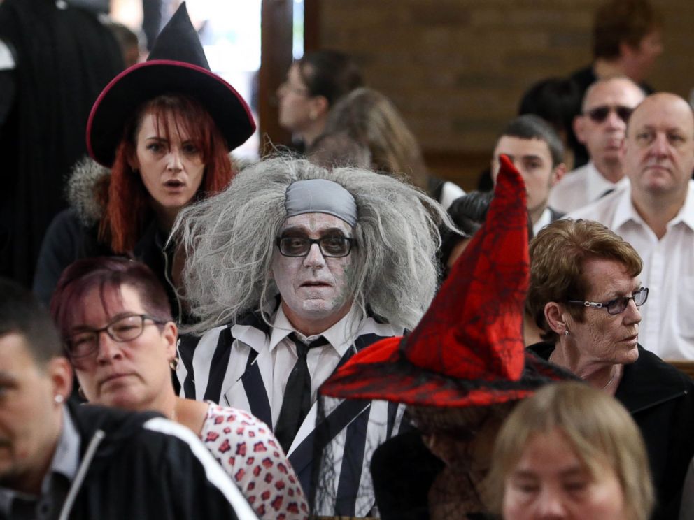 PHOTO: A man dressed as Beetlejuice attends the Halloween-themed funeral, July 15, 2015, of Lorna Johnson,56, at Luton Crematorium, Bedfordshire.