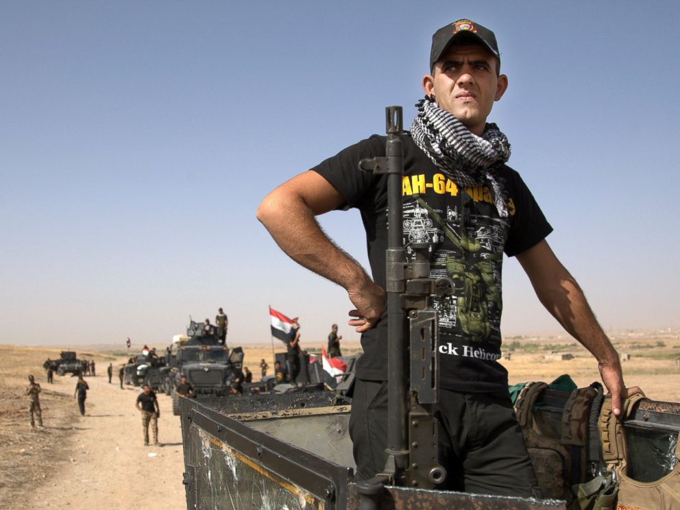 Iraqi special forces soldiers deployed for an offensive to retake Mosul from Islamic State militants prepare to move out from a camp near Khazer, Iraq, on Oct. 14, 2016.