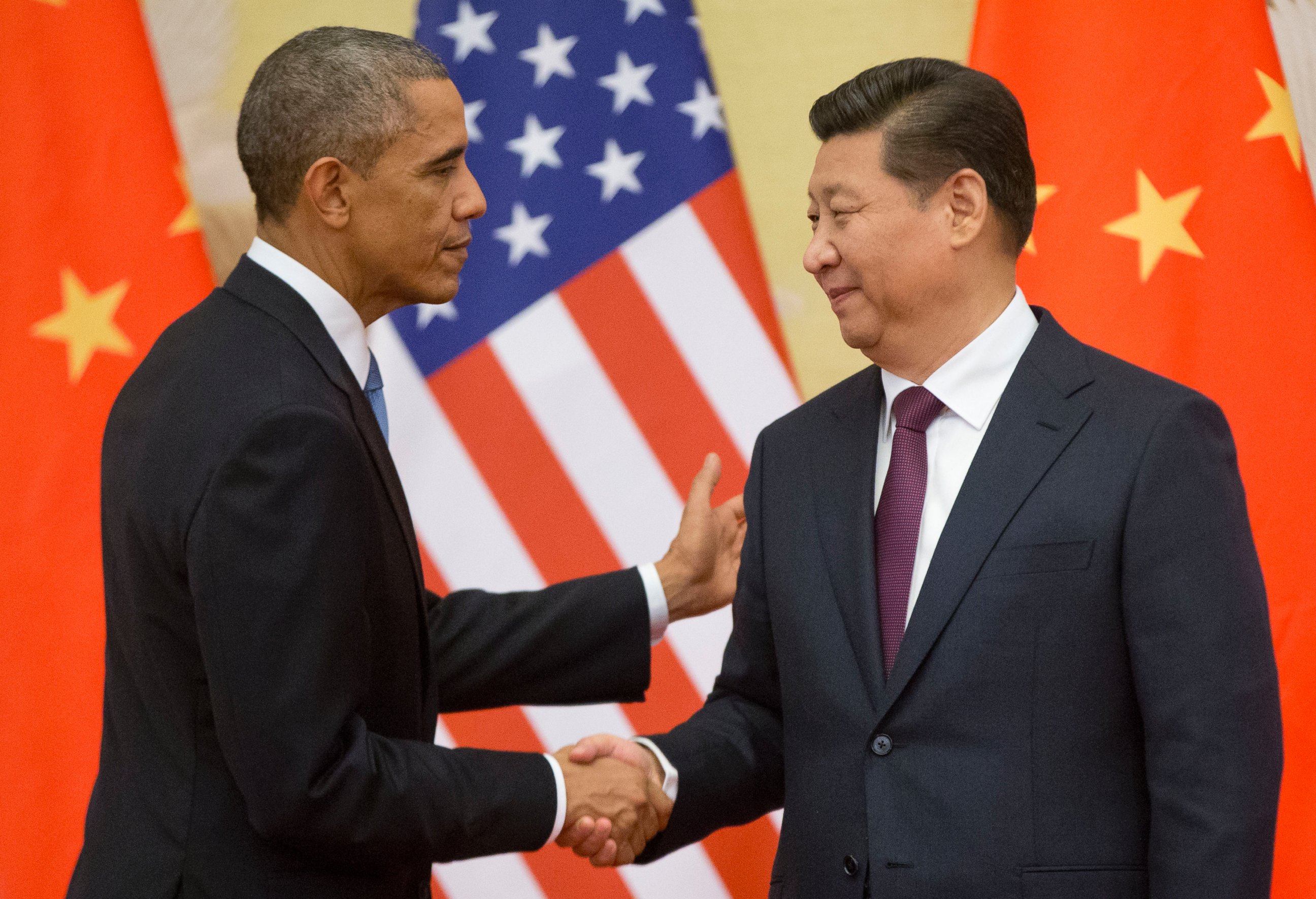 U.S. President Barack Obama, left,  and Chinese President Xi Jinping shake hands following the conclusion of their joint news conference at the Great Hall of the People in Beijing, Nov. 12, 2014.