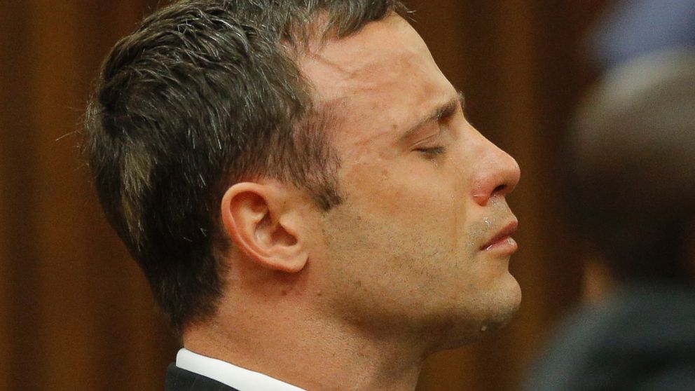 PHOTO: Oscar Pistorius reacts in the dock in Pretoria, South Africa, Sept. 11, 2014 as Judge Thokozile Masipa reads notes as she delivers her verdict in Pistorius' murder trial.
