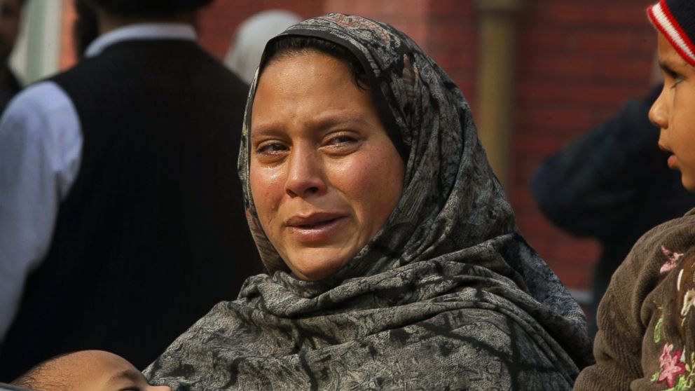 PHOTO: A Pakistani woman weeps as she waits at a hospital, where victims of a Taliban attack are being treated in Peshawar, Pakistan, Dec. 16, 2014.