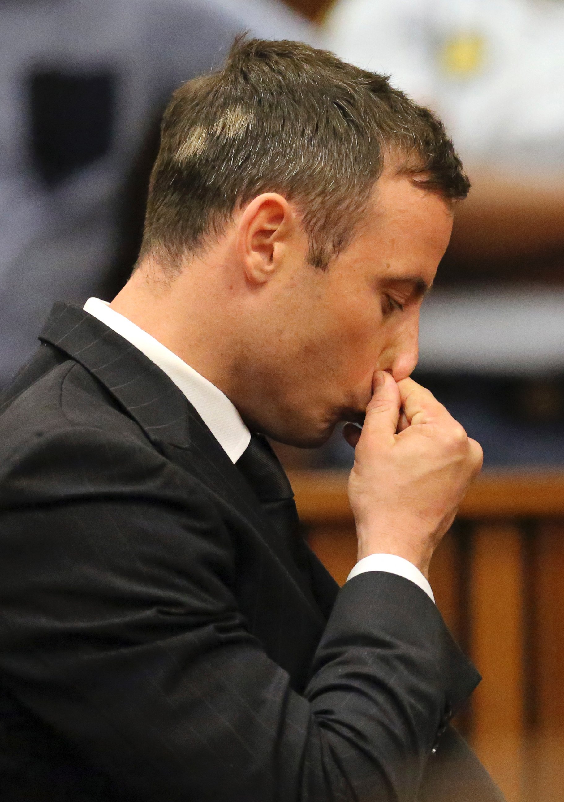 PHOTO: Oscar Pistorius, center, gestures after he was sentenced in court in Pretoria, South Africa, Oct. 21, 2014.