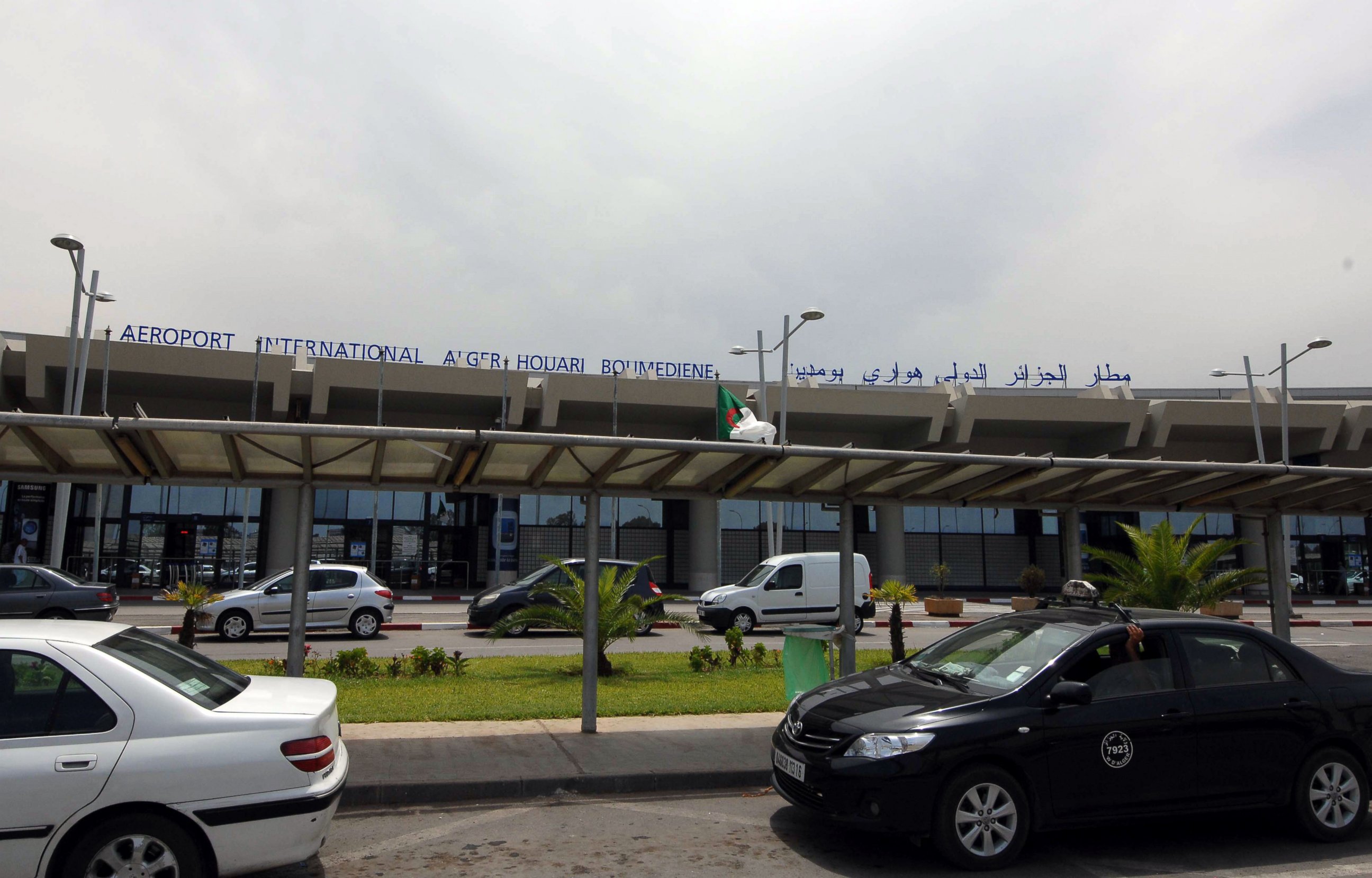 PHOTO: Vehicles are parked outside the Houari Boumedienne international airport near Algiers, Algeria, July 24, 2014.