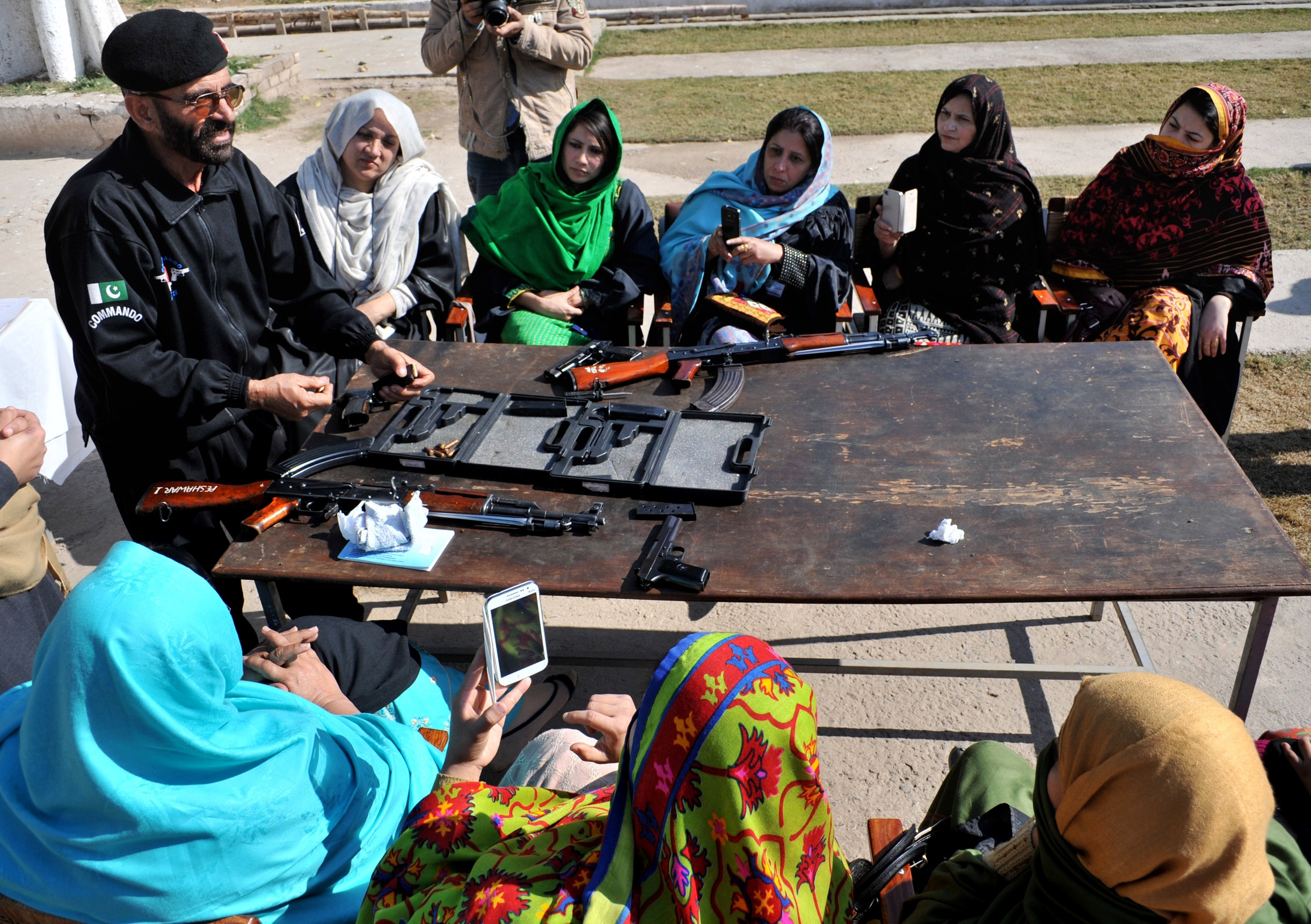 PHOTO: A Pakistani police commando gives weapons training to teachers in Peshawar Pakistan in this Jan. 27, 2015 file photo.  
