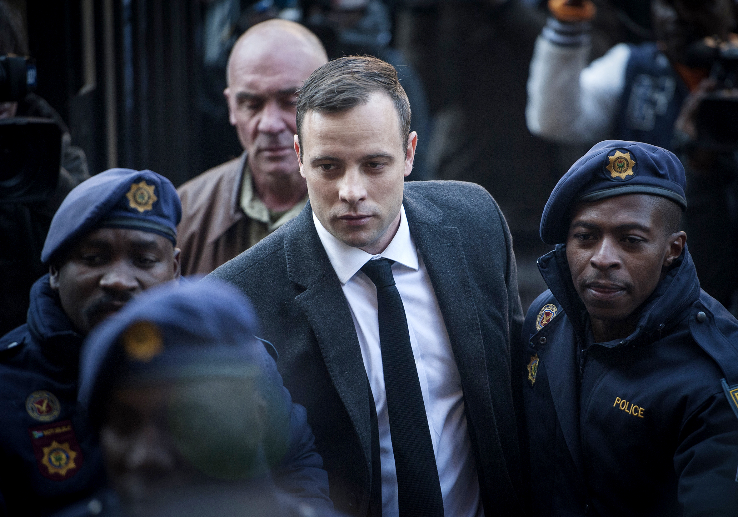 PHOTO: Oscar Pistorius, center, arrives at the High Court in Pretoria, South Africa, July 6, 2016.