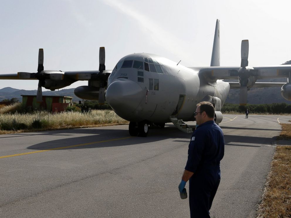 PHOTO: An engineer stands in front of a C-130 HAUP of the Hellenic Air Force, which took part in the searching operation of the missing Egypt plane, at the military air base of Kastelli on the southern Greek island of Crete, May 20, 2016.