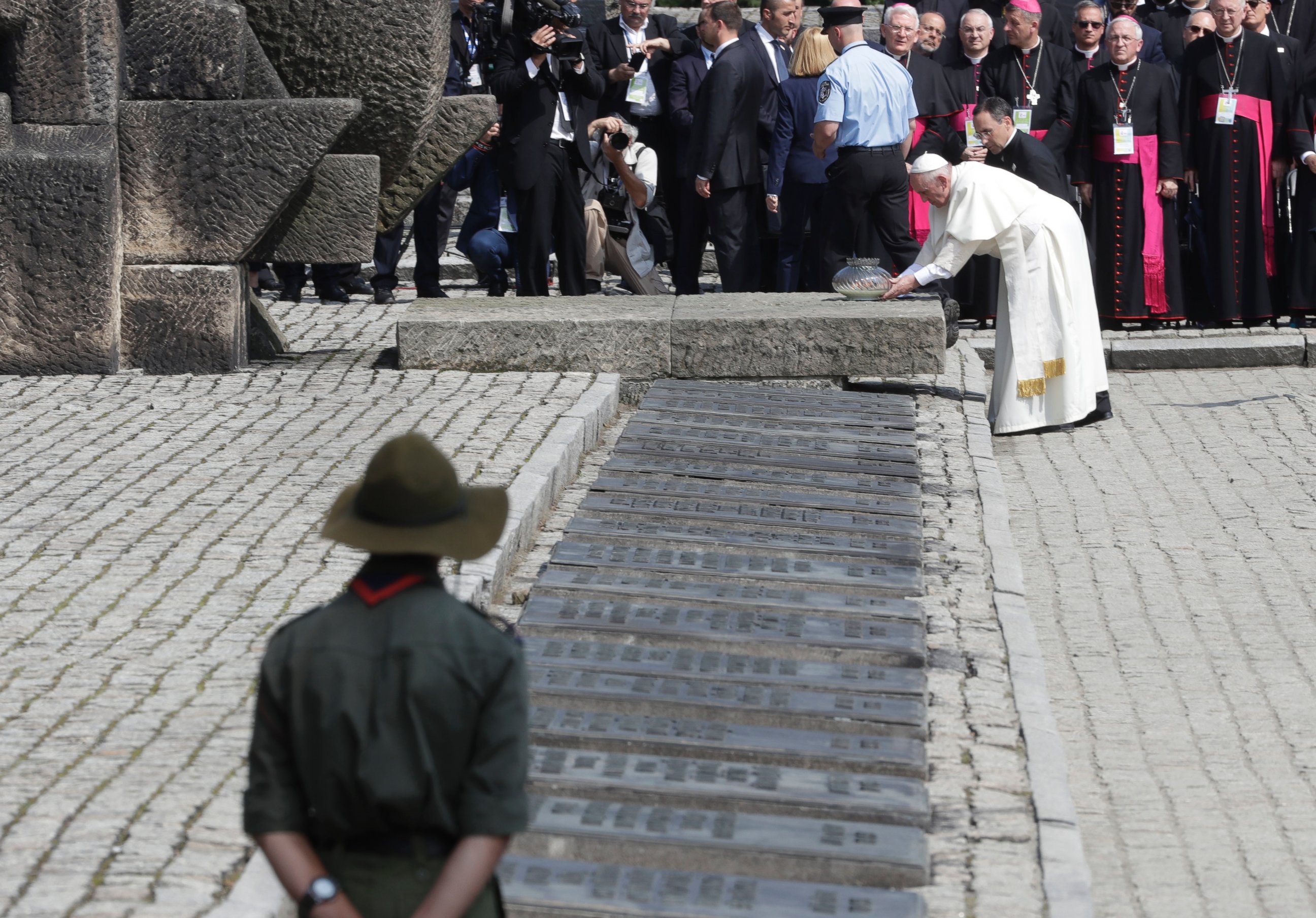 PHOTO: Pope Francis prays in front of the Memorial at the former Nazi Death Camp Auschwitz-Birkenau, in Oswiecim, Poland, July 29, 2016.  