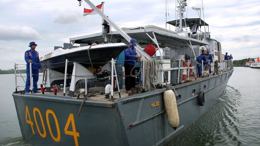 Indonesia's Marine Police head out to sea in search for the missing AirAsia flight 8501, at Pangkal Pinang port in Sumatra Island, Dec. 29, 2014 in Indonesia.