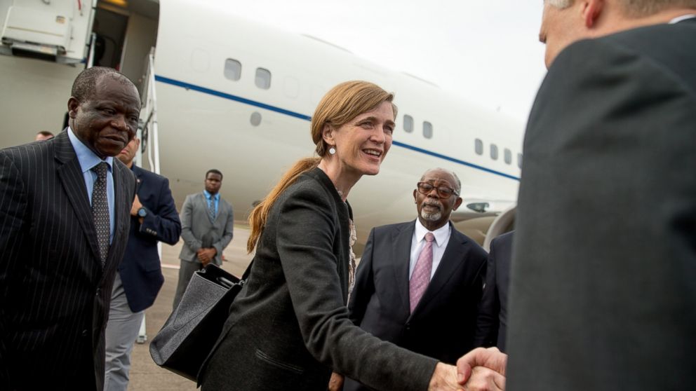 U.S. Ambassador to the United Nations Samantha Power, center, accompanied by Cameroon External Relations Minister Mbella Mbella, right, arrives at Yaounde Nsimalen International Airport in Yaounde, Cameroon on April 17, 2016. 