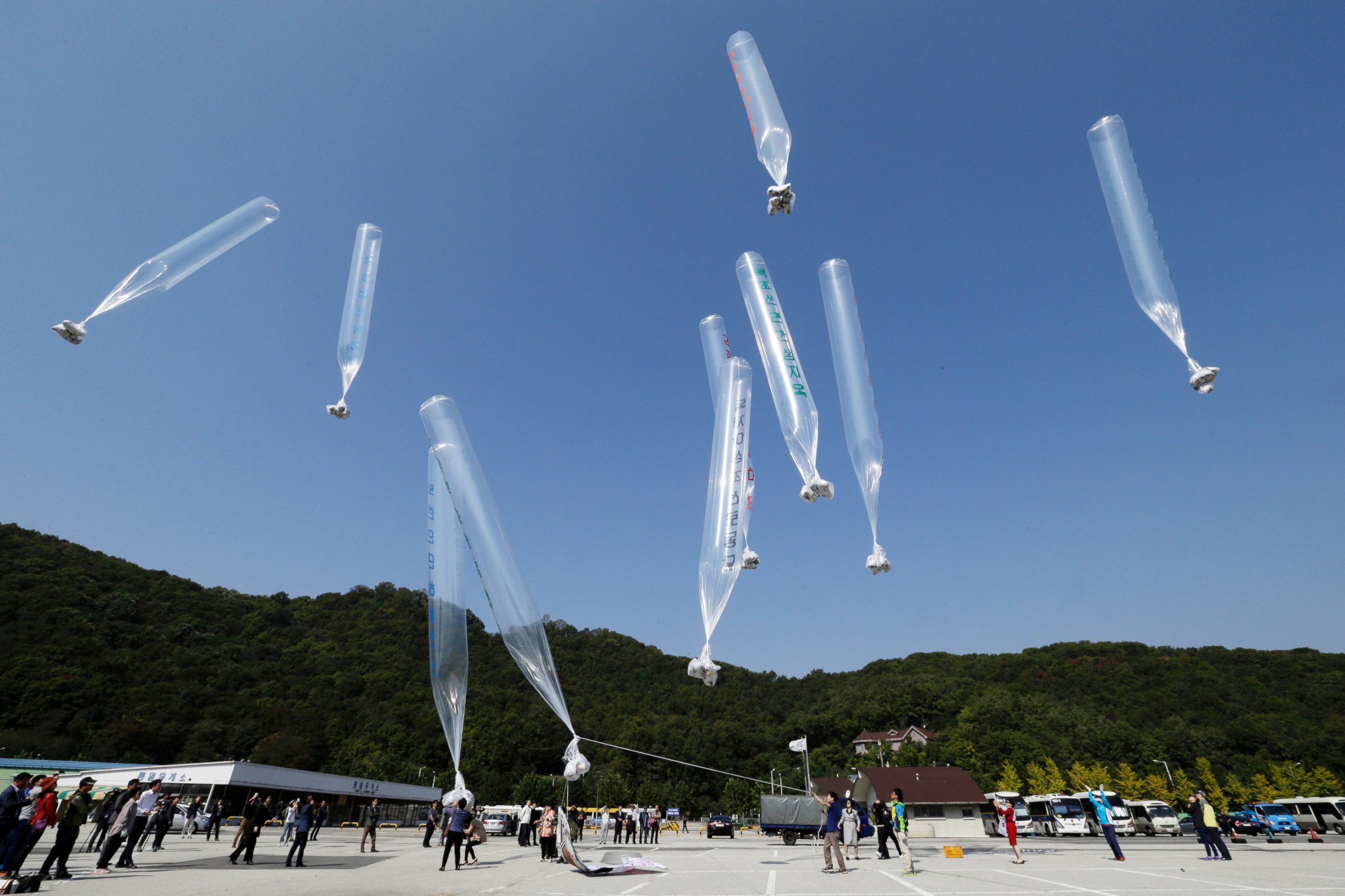 PHOTO: North Korean defectors release balloons carrying leaflets condemning North Korean leader Kim Jong Un and his government's policies near the border of North Korea and South Korea, Oct. 10, 2014. 