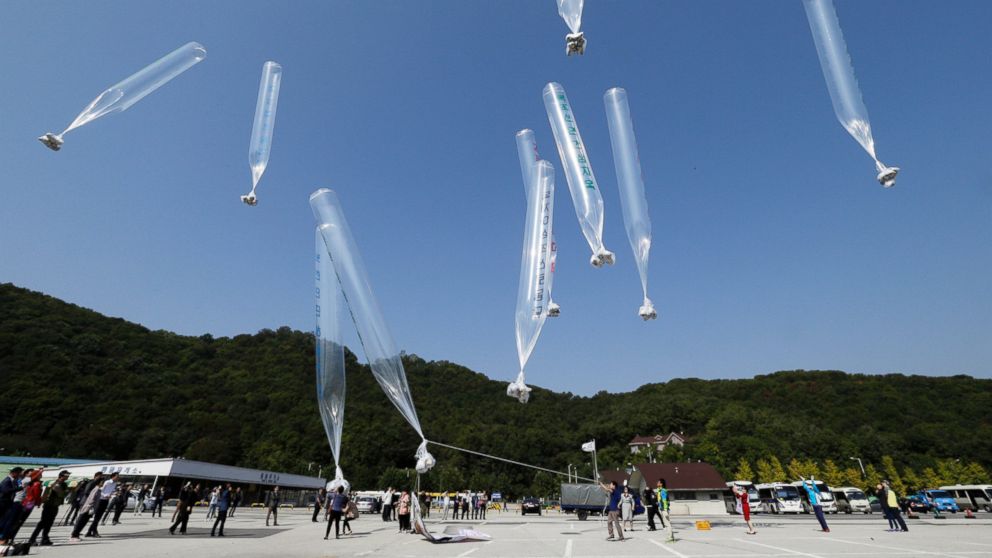PHOTO: North Korean defectors release balloons carrying leaflets condemning North Korean leader Kim Jong Un and his government's policies near the border of North Korea and South Korea, Oct. 10, 2014.