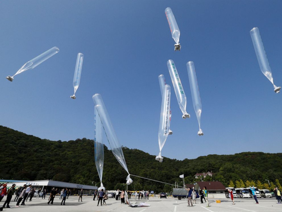 PHOTO: North Korean defectors release balloons carrying leaflets condemning North Korean leader Kim Jong Un and his governments policies near the border of North Korea and South Korea, Oct. 10, 2014.
