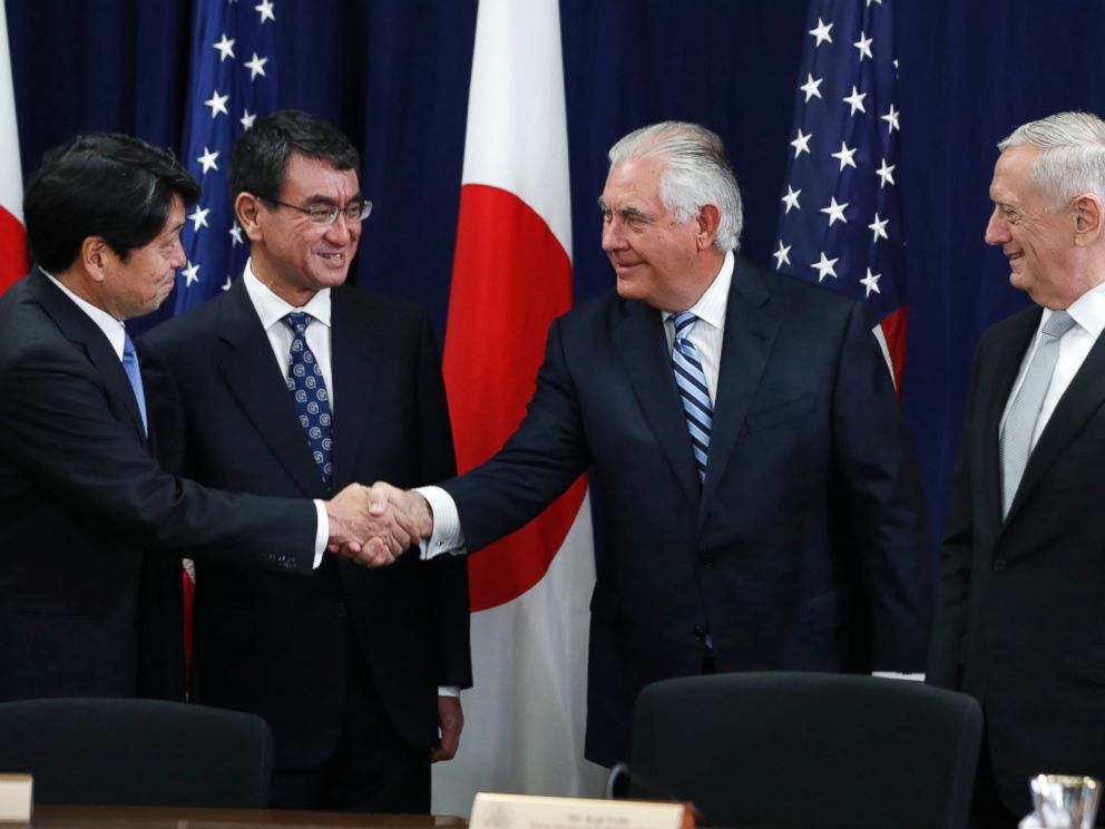Japanese Defense Minister Itsunori Onodera, left, next to Japanese Foreign Minister Taro Kono, shakes hands with Secretary of State Rex Tillerson, at the start of a Security Consultative Committee meeting, Thursday, Aug. 17, 2017.