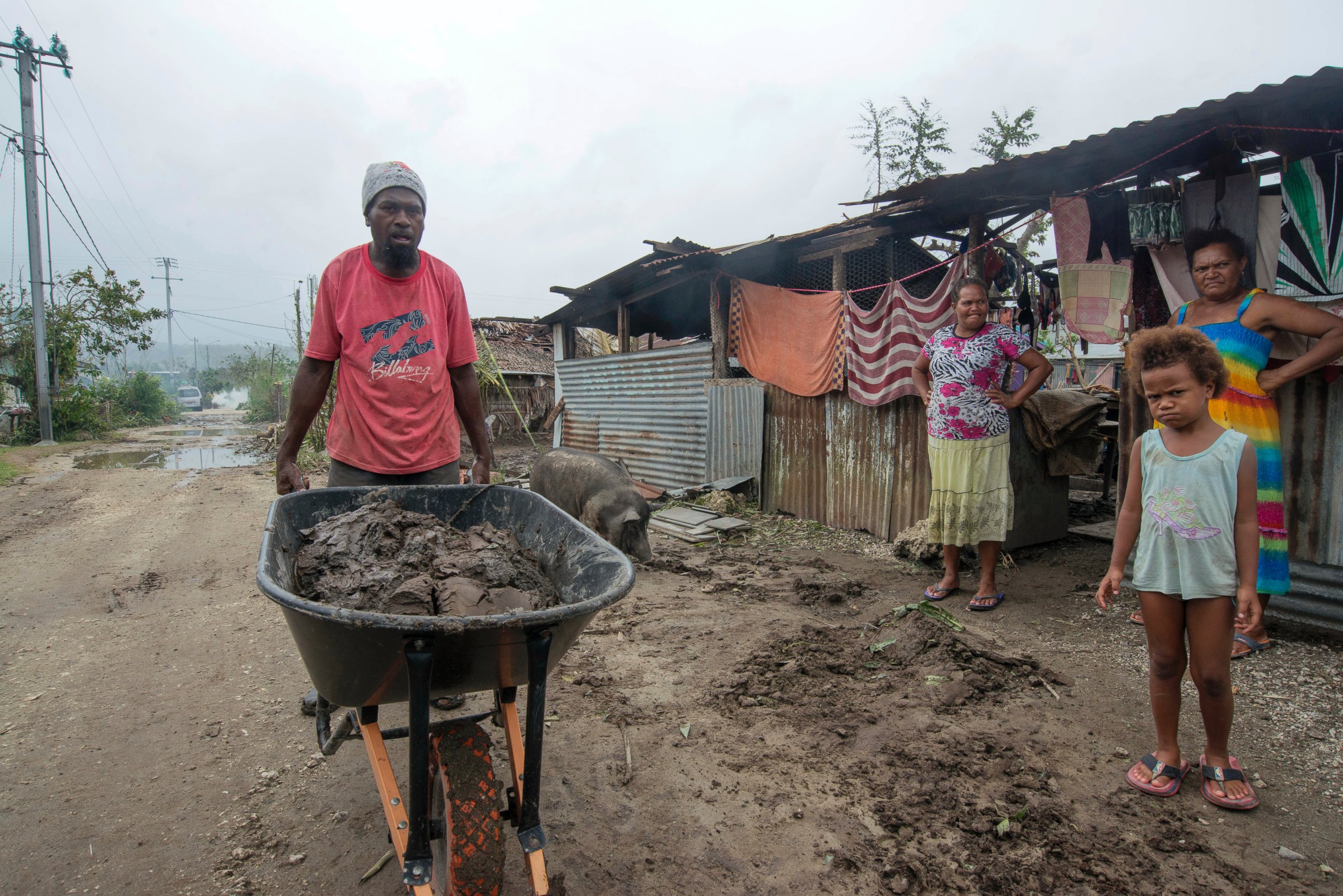 PHOTO: Residents work to recover from Cyclone Pam in Mele village, on the outskirts of the capital Port Vila, Vanuatu, March 15, 2015.