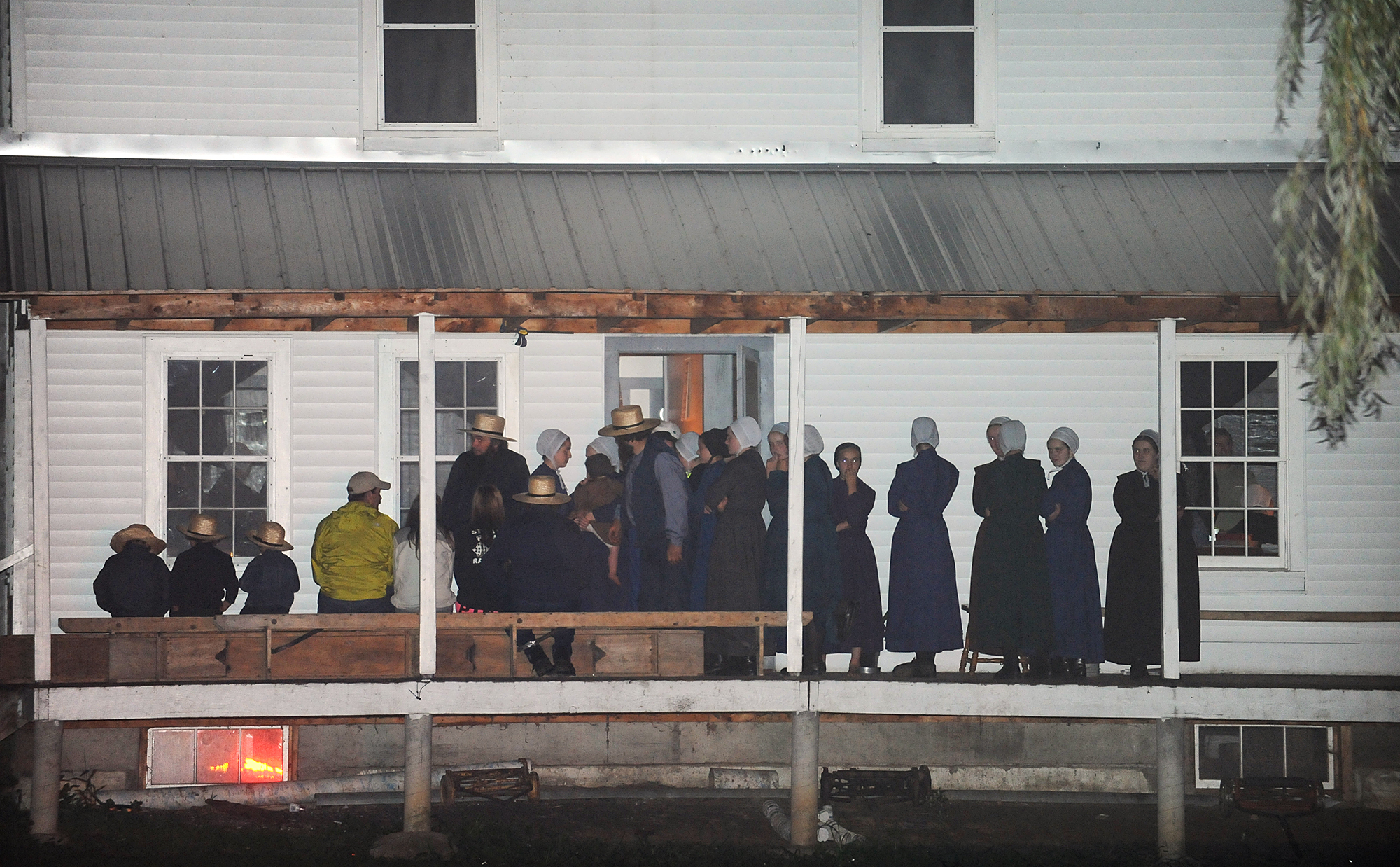 PHOTO: Supporters gather on the porch of a house at the intersection of Route 812 and Mt. Alone Road